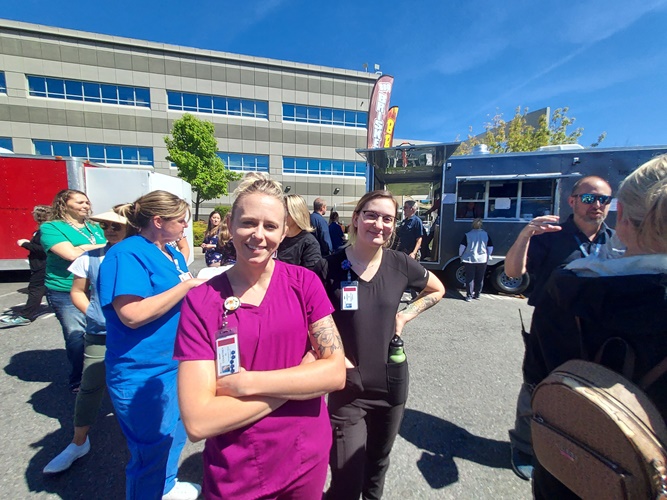 Temperatures rose to the mid-80s as pharmacy techs Courtney and Lindsey stopped by a food truck.